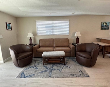 6154 Midnight Pass Road - Photo Thumbnail 1