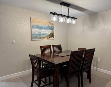 6154 Midnight Pass Road - Photo Thumbnail 4