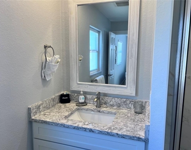 6154 Midnight Pass Road - Photo Thumbnail 19