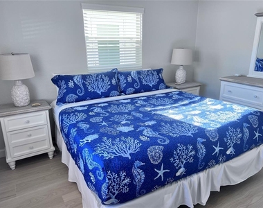 6154 Midnight Pass Road - Photo Thumbnail 10