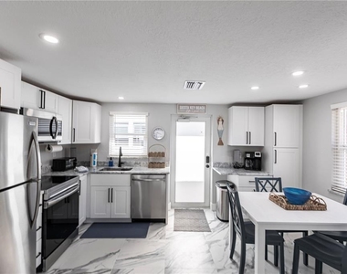 6154 Midnight Pass Road - Photo Thumbnail 8