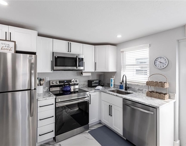 6154 Midnight Pass Road - Photo Thumbnail 9