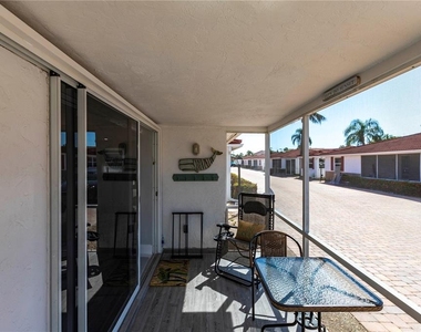 6154 Midnight Pass Road - Photo Thumbnail 1