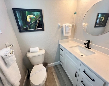 6154 Midnight Pass Road - Photo Thumbnail 8