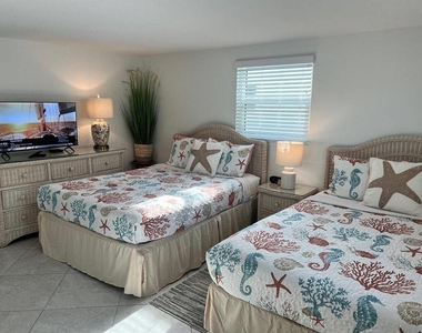 6154 Midnight Pass Road - Photo Thumbnail 8