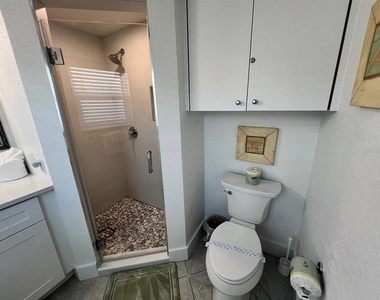 6154 Midnight Pass Road - Photo Thumbnail 7