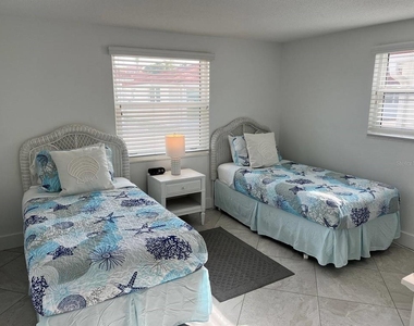 6154 Midnight Pass Road - Photo Thumbnail 6