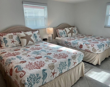 6154 Midnight Pass Road - Photo Thumbnail 4