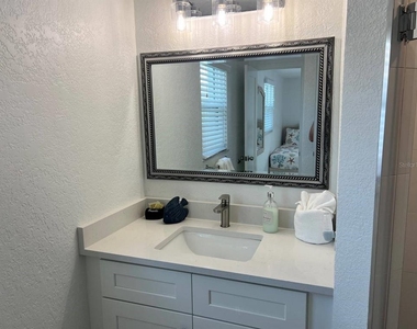 6154 Midnight Pass Road - Photo Thumbnail 10