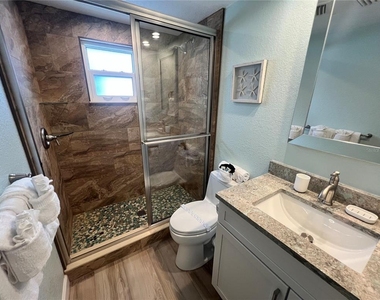 6154 Midnight Pass Road - Photo Thumbnail 8