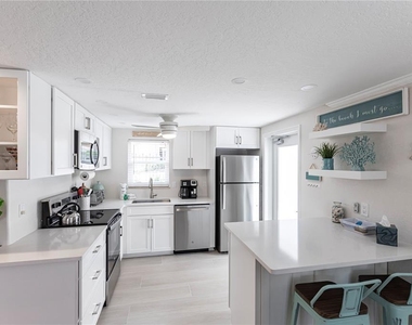 6154 Midnight Pass Road - Photo Thumbnail 8
