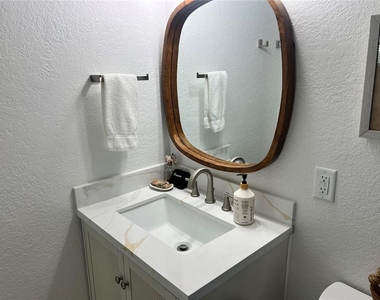 6154 Midnight Pass Road - Photo Thumbnail 8