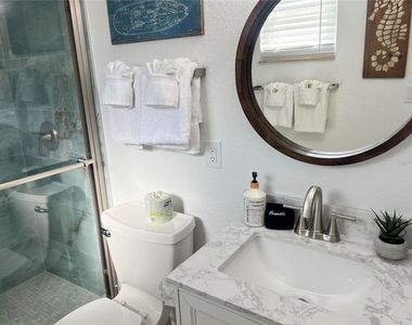 6154 Midnight Pass Road - Photo Thumbnail 12
