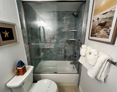 6154 Midnight Pass Road - Photo Thumbnail 9