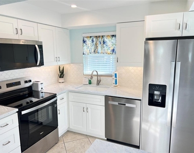 6154 Midnight Pass Road - Photo Thumbnail 1