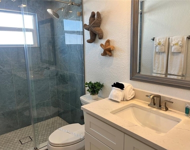 6154 Midnight Pass Road - Photo Thumbnail 11