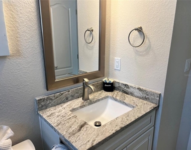 6154 Midnight Pass Road - Photo Thumbnail 8