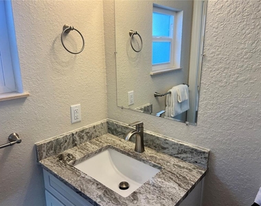 6154 Midnight Pass Road - Photo Thumbnail 11