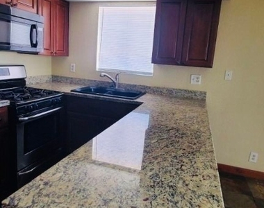 6935 Kepler Drive - Photo Thumbnail 2