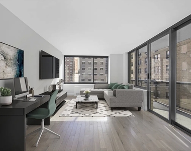 W 48th St - Photo Thumbnail 3