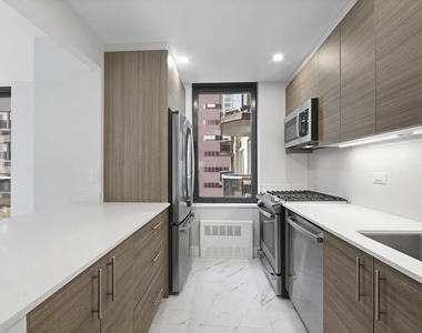 W 48th St - Photo Thumbnail 1
