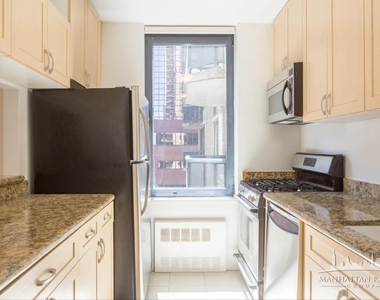 W 48th St - Photo Thumbnail 1