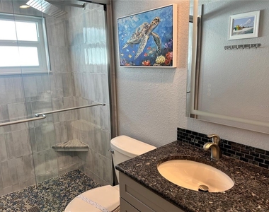 6154 Midnight Pass Road - Photo Thumbnail 8