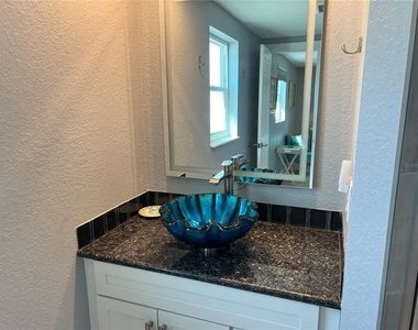 6154 Midnight Pass Road - Photo Thumbnail 12