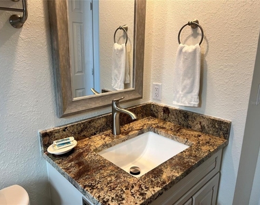 6154 Midnight Pass Road - Photo Thumbnail 14