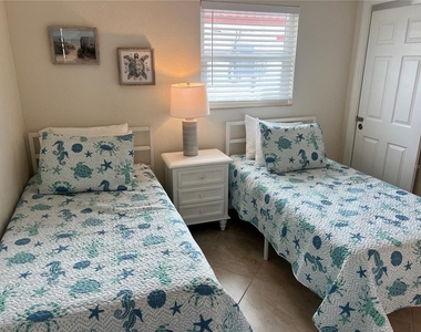 6154 Midnight Pass Road - Photo Thumbnail 10