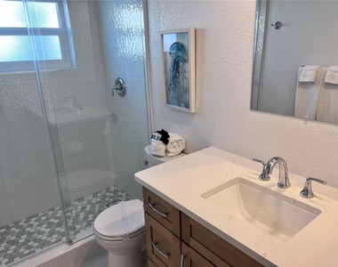 6154 Midnight Pass Road - Photo Thumbnail 11