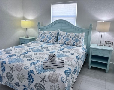 6154 Midnight Pass Road - Photo Thumbnail 9