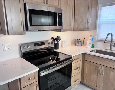 6154 Midnight Pass Road - Photo Thumbnail 3