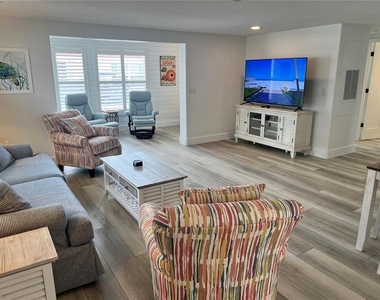 6154 Midnight Pass Road - Photo Thumbnail 3