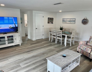 6154 Midnight Pass Road - Photo Thumbnail 2