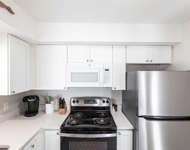 6020 Midnight Pass Road - Photo Thumbnail 7