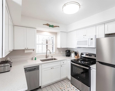 6020 Midnight Pass Road - Photo Thumbnail 11