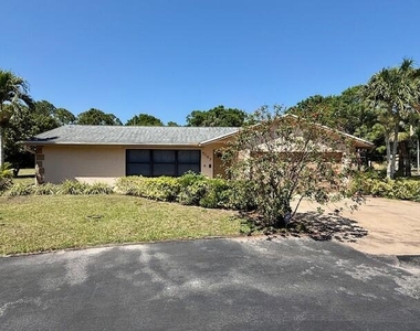 7107 181st Street N - Photo Thumbnail 1