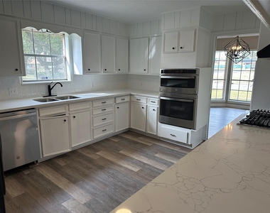 4821 Burning Tree Drive - Photo Thumbnail 5