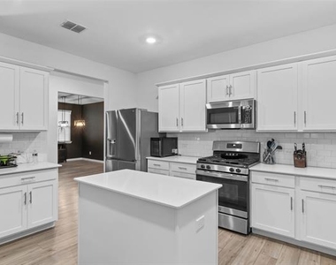 8716 Whistling Duck Drive - Photo Thumbnail 2