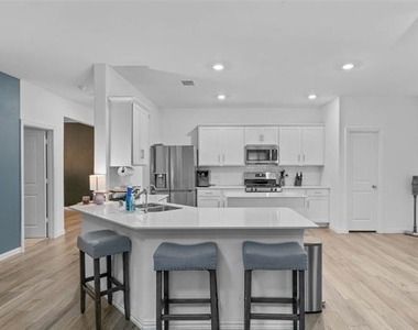 8716 Whistling Duck Drive - Photo Thumbnail 3
