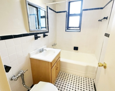 35-15 Leverich Street - Photo Thumbnail 4