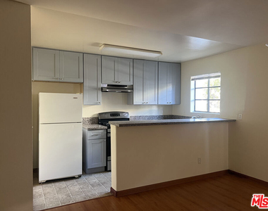 331 S Gramercy Place - Photo Thumbnail 1