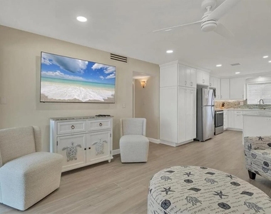 6006 Midnight Pass Road - Photo Thumbnail 4