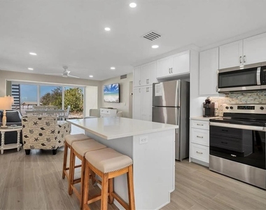 6006 Midnight Pass Road - Photo Thumbnail 9