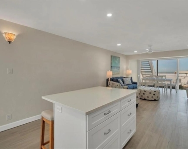 6006 Midnight Pass Road - Photo Thumbnail 8