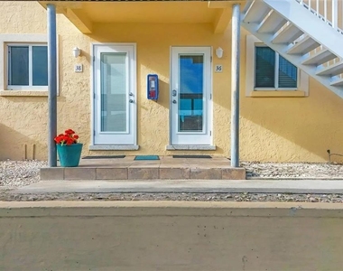 6006 Midnight Pass Road - Photo Thumbnail 2
