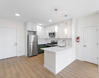 321 E 3rd St - Photo Thumbnail 7