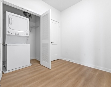 321 E 3rd St - Photo Thumbnail 29
