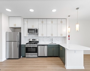 321 E 3rd St - Photo Thumbnail 9